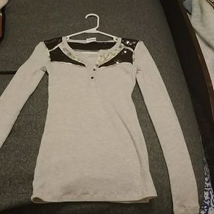 Long sleeve with brown sequence has little button'